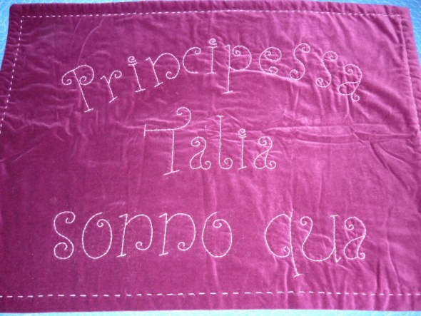"Princess Talia sleeps here". A beautiful deep fushia with pink thread. A bit hit with the aunts and nanas!